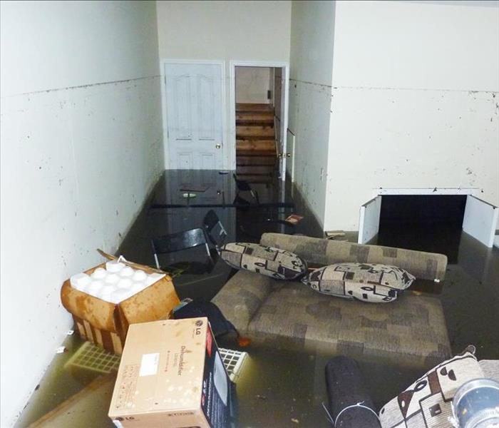 Completely flooded basement. It is visible line showing maximum water level higher than 7 feet.