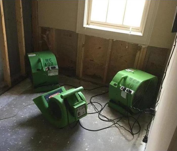 Flood cuts performed in a room, drying equipment placed inside the room