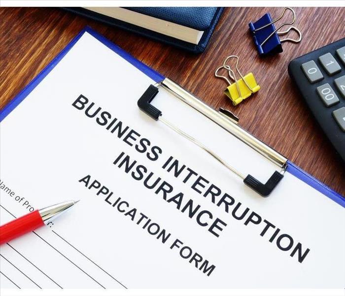 Business Insurance. Composition with Clipboard, Calculator, Glasses, Green Flower and Office Supplies on Desk